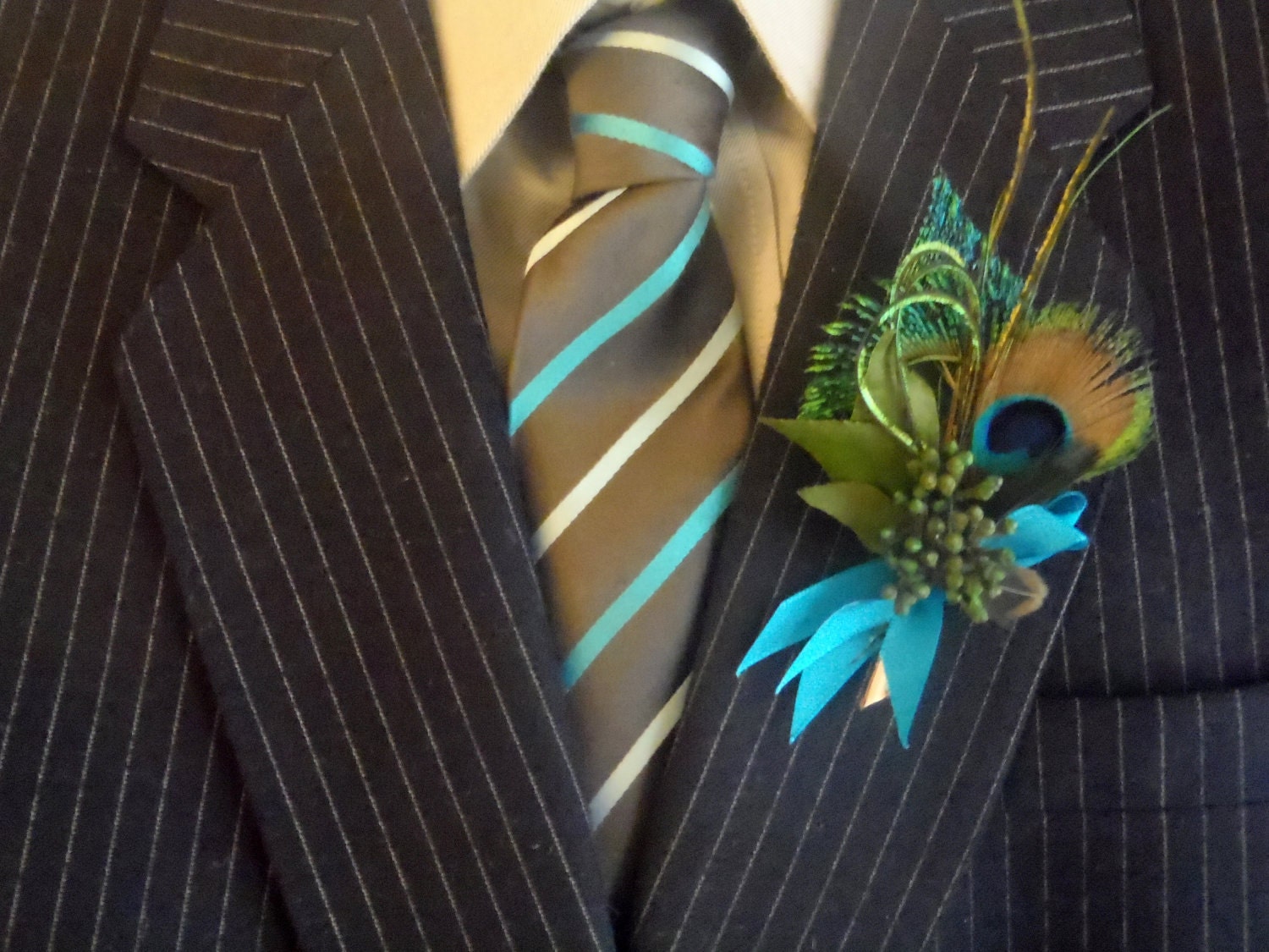 Peacock boutonniere, lovely and elegant classic favorite
