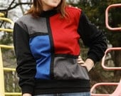 Colorblock sweatshirt. Red, blue, black.