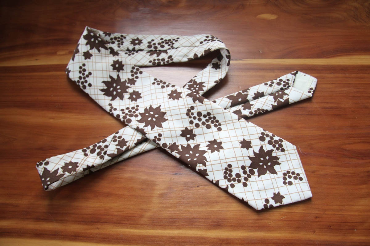 1970s brown and cream floral necktie. From Sears mens.