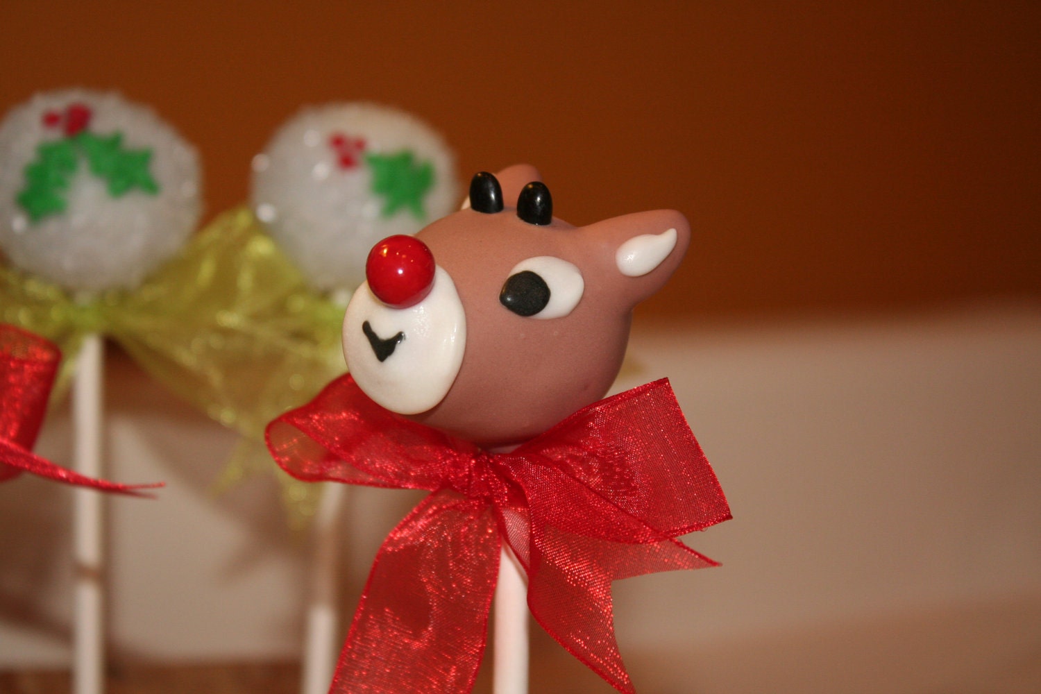 Mom's Killer Cakes & Cookies Rudolph And Clarice Cake Pops Hermey, Yukon Cornelius, Misfit Toys Santa and Mrs. Claus Also Available
