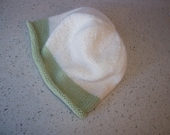 Cashmere cream knitted baby hat with green band