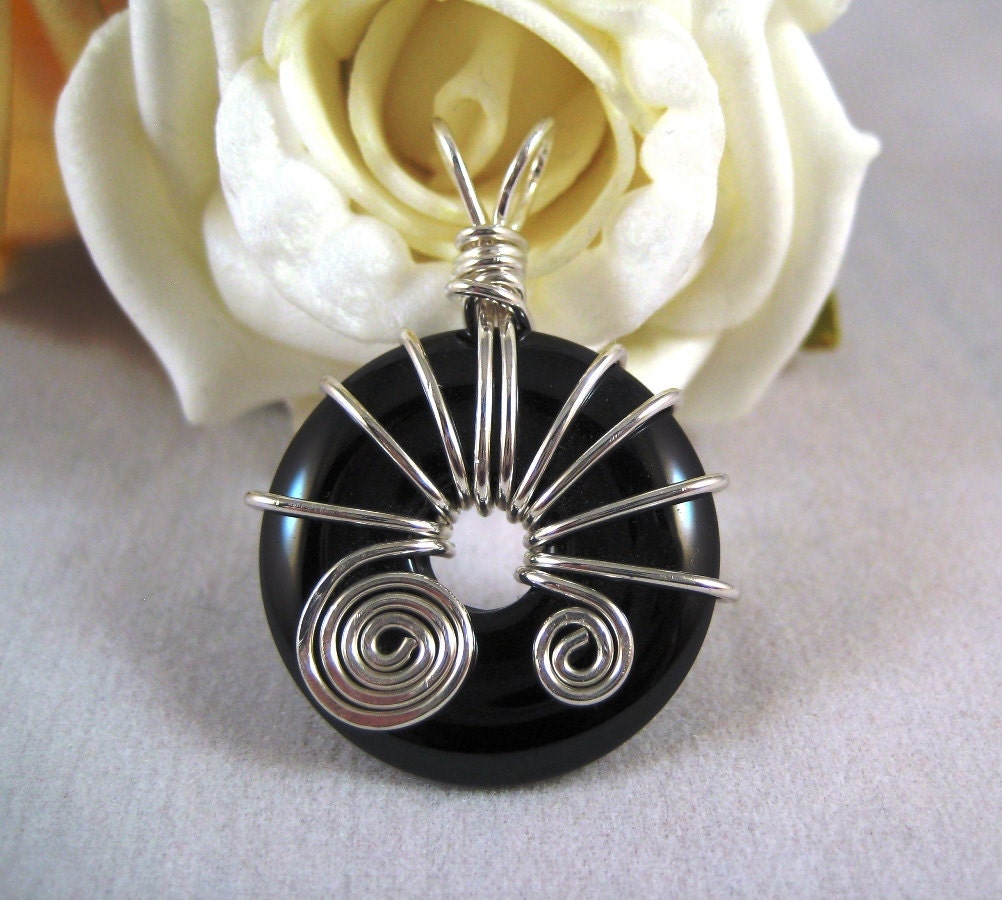 Silver and black onyx donut bead pendant