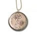 Medallion necklace - round brass pendant with an handmade illustration of a naked women coated in enamel (resin)