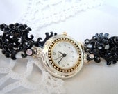 Round Two Toned Watch Face with Black Filigree Aurora Borealis Stones and the Easiest Clasp Ever