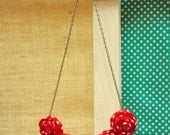 the meg- rosette necklace in scarlet and polkadots