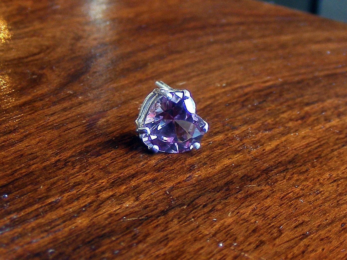 Purple heart sapphire tie tack in silver.