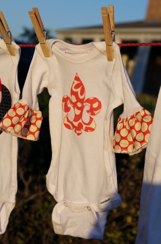 Fleur De Lis Ruffled Long Sleeve Applique Onesie