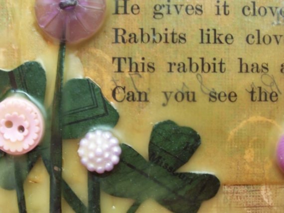 RABBITS LIKE CLOVER- natural beeswax encaustic collage with vintage button flowers and antique child's reader page