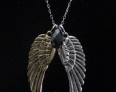 Two-Tone Black Swan Necklace on Silver Chain