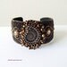 Chocolate bead embroidery cuff bracelet with ammonite shell cabochon in coffee brown, gold and bronze
