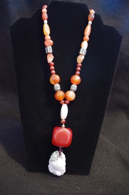 Carved Jade, Carnelian Amber and Silver