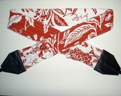 Classy Red and White Damask camera strap, reversible, 2 expandable pockets with stretchable elastic.