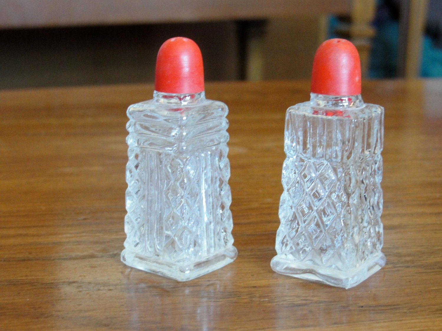 Clear Glass Salt and Pepper Shakers with Red tops