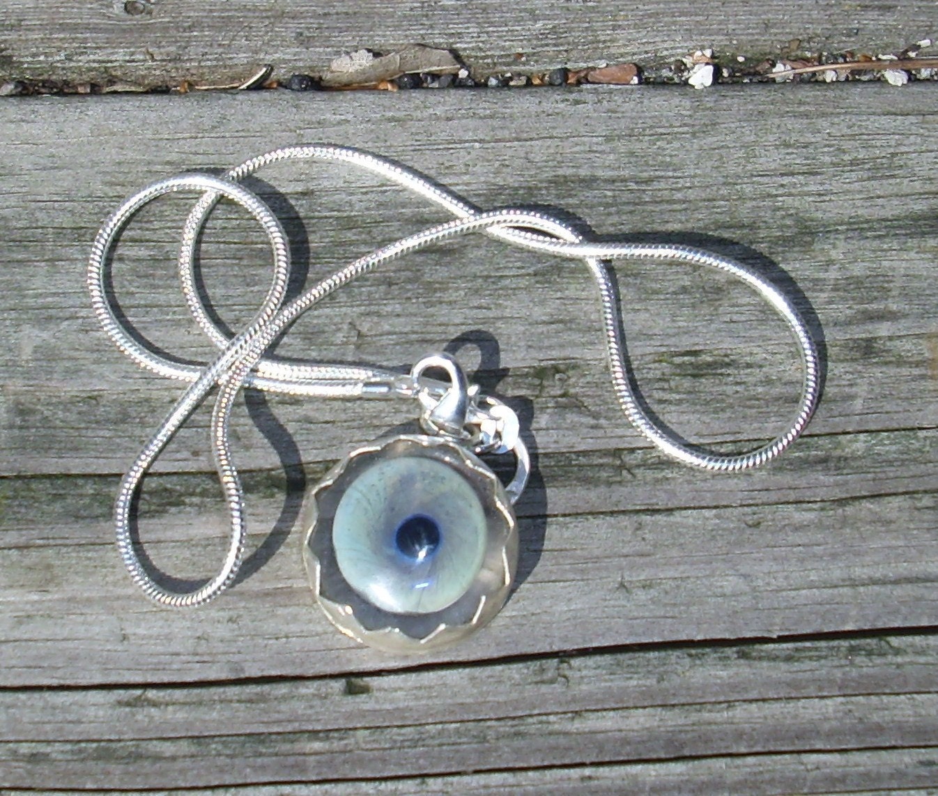 Blue Glass Eye Necklace set in sterling silver