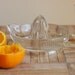 RESERVED. Clear Glass Depression Era Juicer/Reamer with Handle