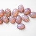 12 vintage glass fire opal oval cabochons HC058. This is the last bits of this item. when its gone its gone.