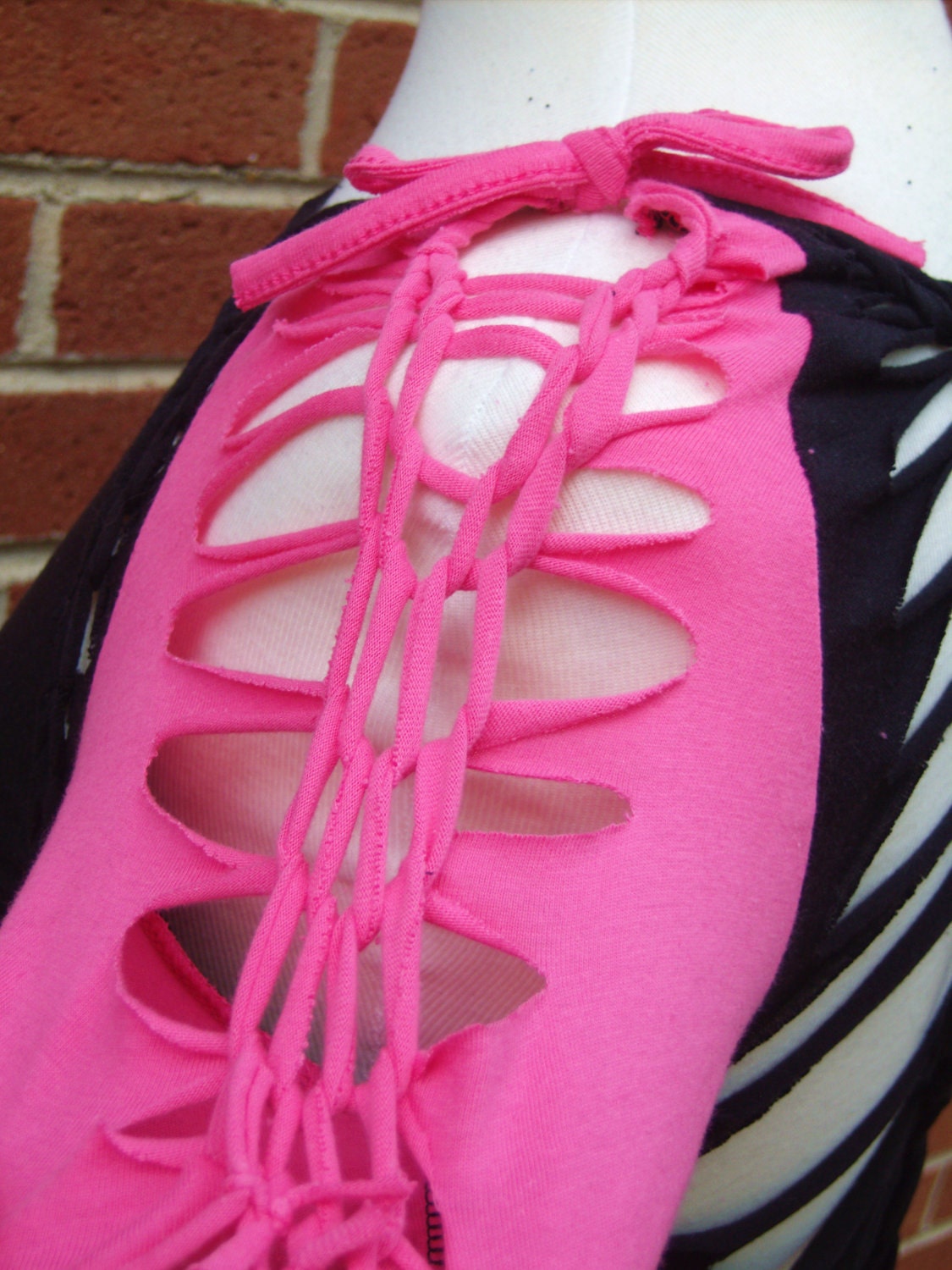 ripped t shirt braided shredded embroidered black and pink shot through the heart altered couture