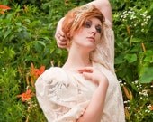 Beautiful vintage cream lace 70's dress with ribbon belt and puff sleeves