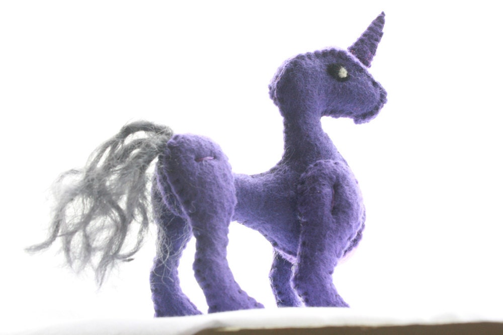 purple felt unicorn-ish doll