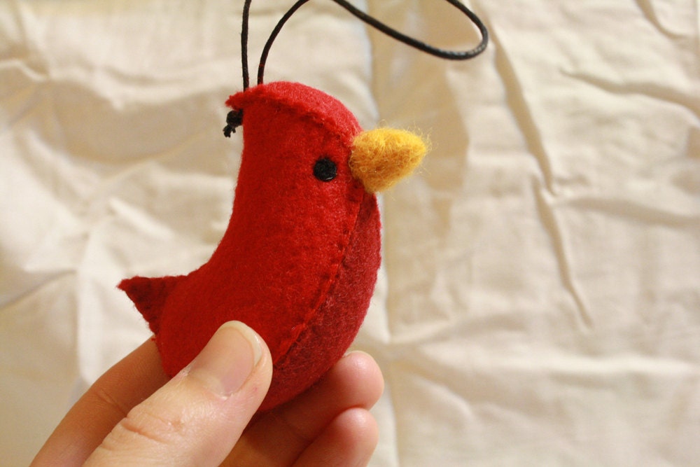 set of red, blue and yellow "banana bird" felt ornaments