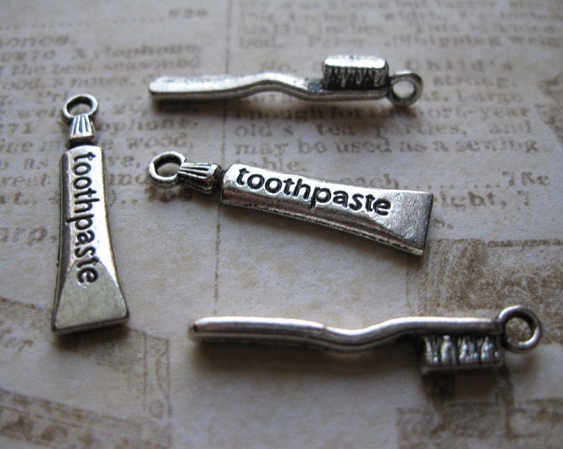 Collection of 4 dental charms in silver tone by CharmEmporium