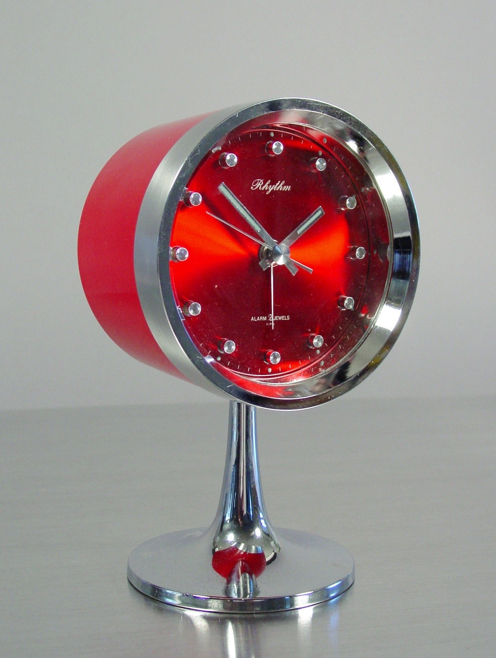 Table Clock with Tulip Base by Rhythm. Mod Chrome and Red Atomic Space Age Alarm Clock. Mid Century Modern Saarinen inspired.
