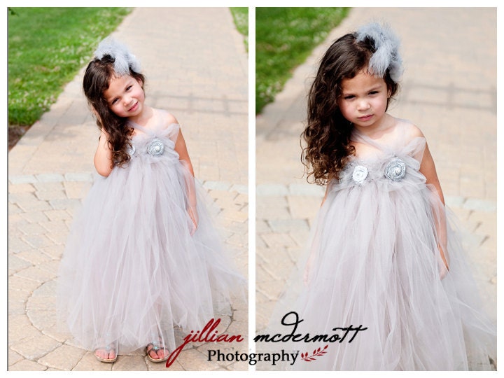Vintage Collection.Grey tulle dress with silver handrolled rosettes and button embellishments. Headband sold separately.