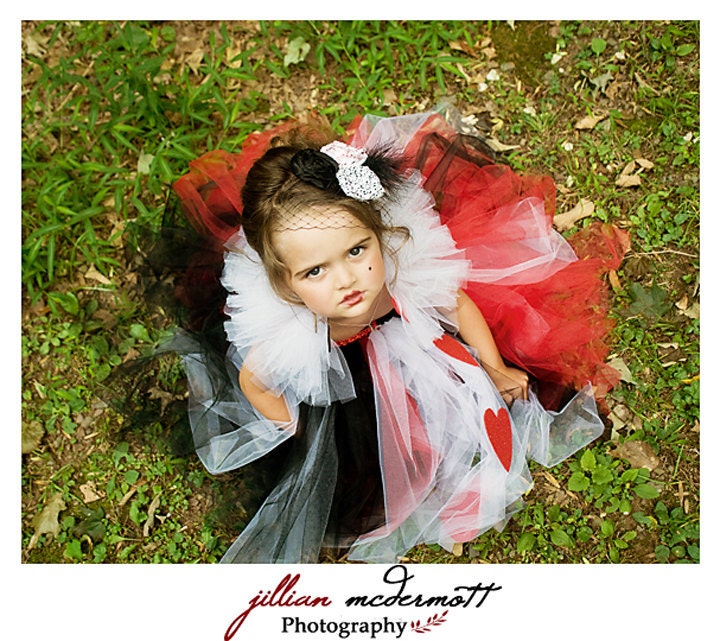 Queen of Hearts inspired tutu dress. Crocheted red and black top. White tutu collar with spades and hearts. Featured in Model Life magazine