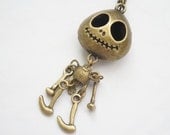 Geeky Dancing Skeleton Necklace - Antiqued Brass