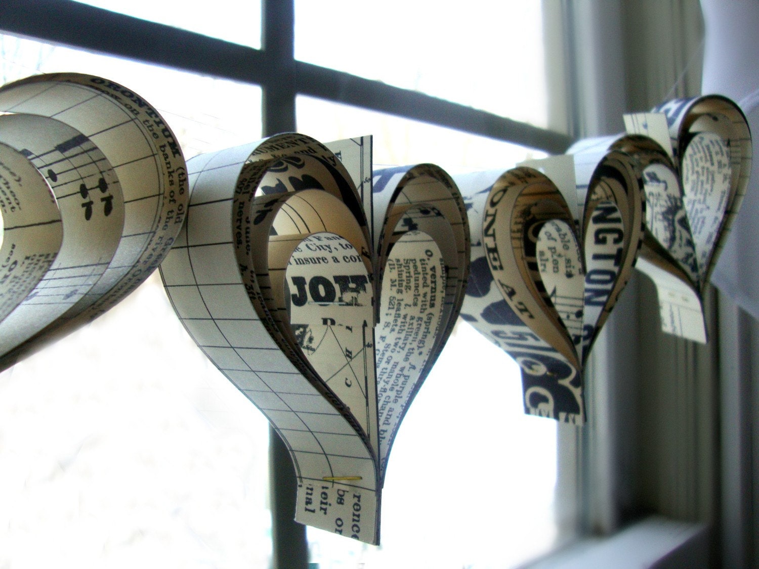 Love paperie   a garland of hand cut hearts