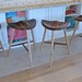 Stool made in sustainably sourced black walnut.