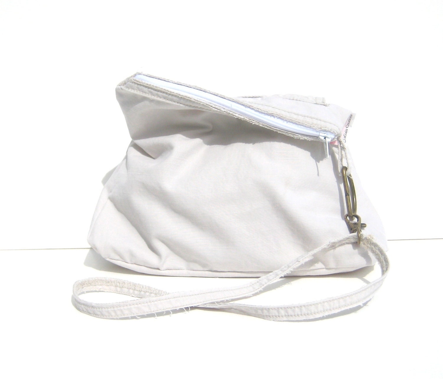 Small Purse. Clutch. Wristlet. Removable Strap. Zipper Closure. Exterior Pocket, Gadget Case.