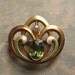 Art Nouveau Brooch 14 Karat Gold With Peridot And Seed Pearl By Bippart Griscom and Osborn Circa 1900
