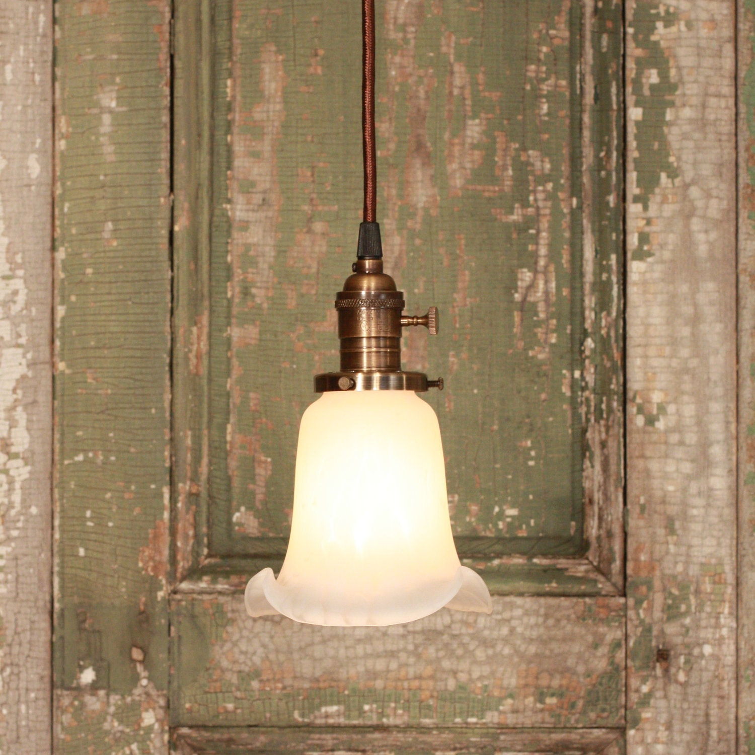 Kitchen Lighting with Dappled Soft White Shade and Exposed Socket