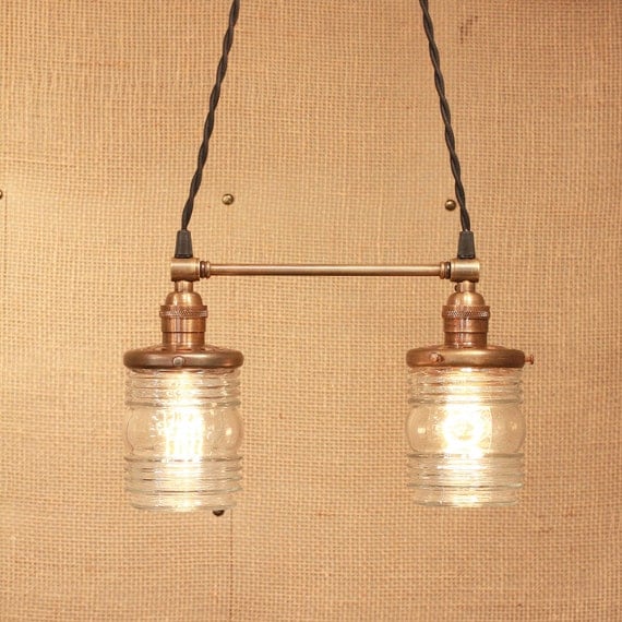Chandelier Lighting with Twin Glass Shades and Antique Brass Spreader Bar and Black Twisted Wire