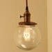 Pendant Light With 6" Glass Globe Shade and Exposed Socket