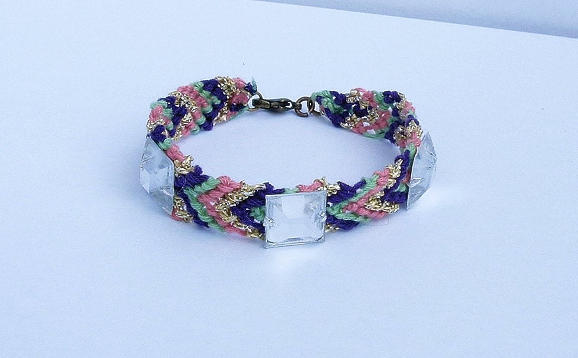 Rhinestone studded friendship bracelet.