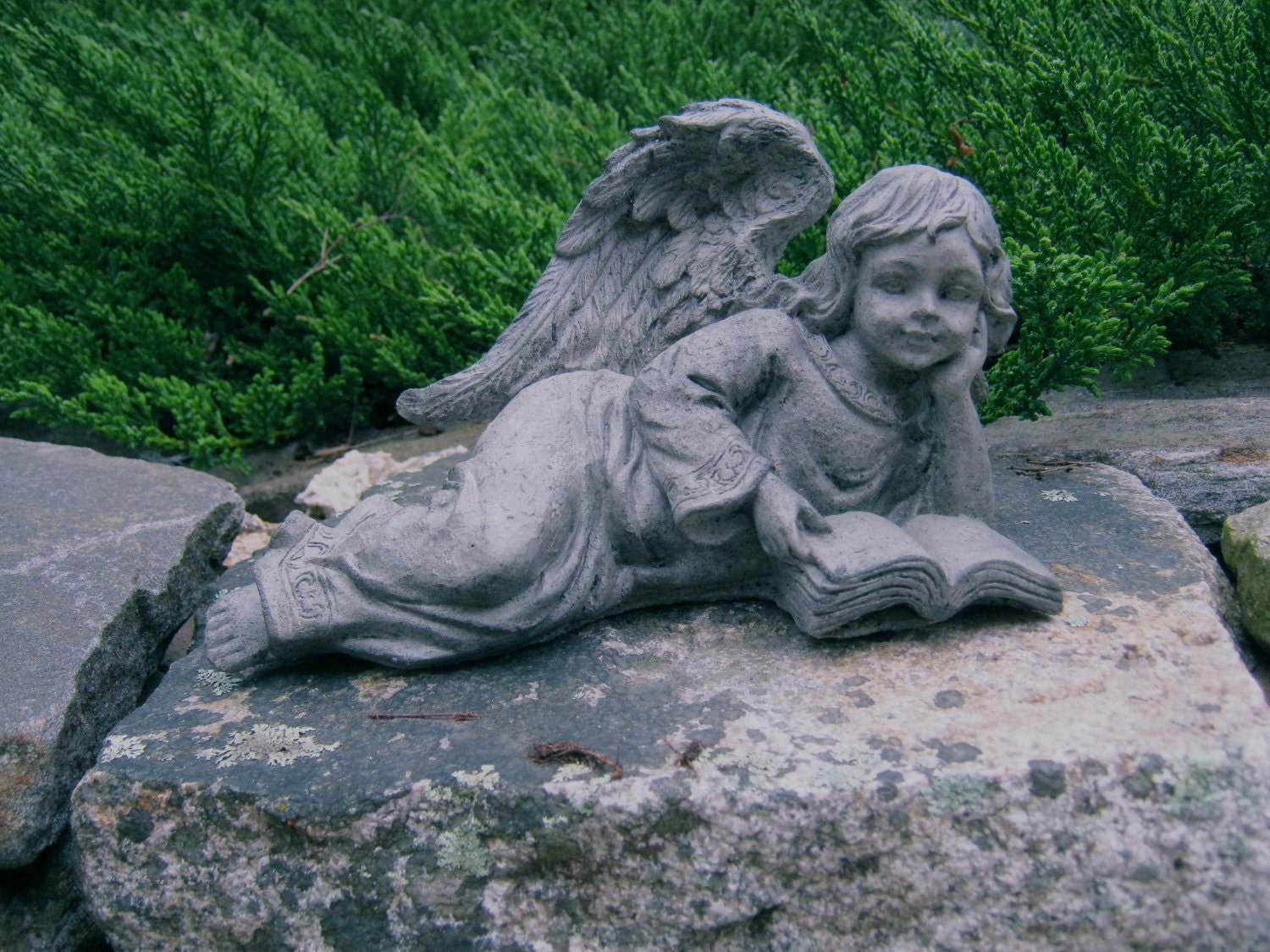 Angel Girl Reading and Relaxing Concrete Garden Statue.