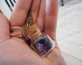 Amethyst filled vial