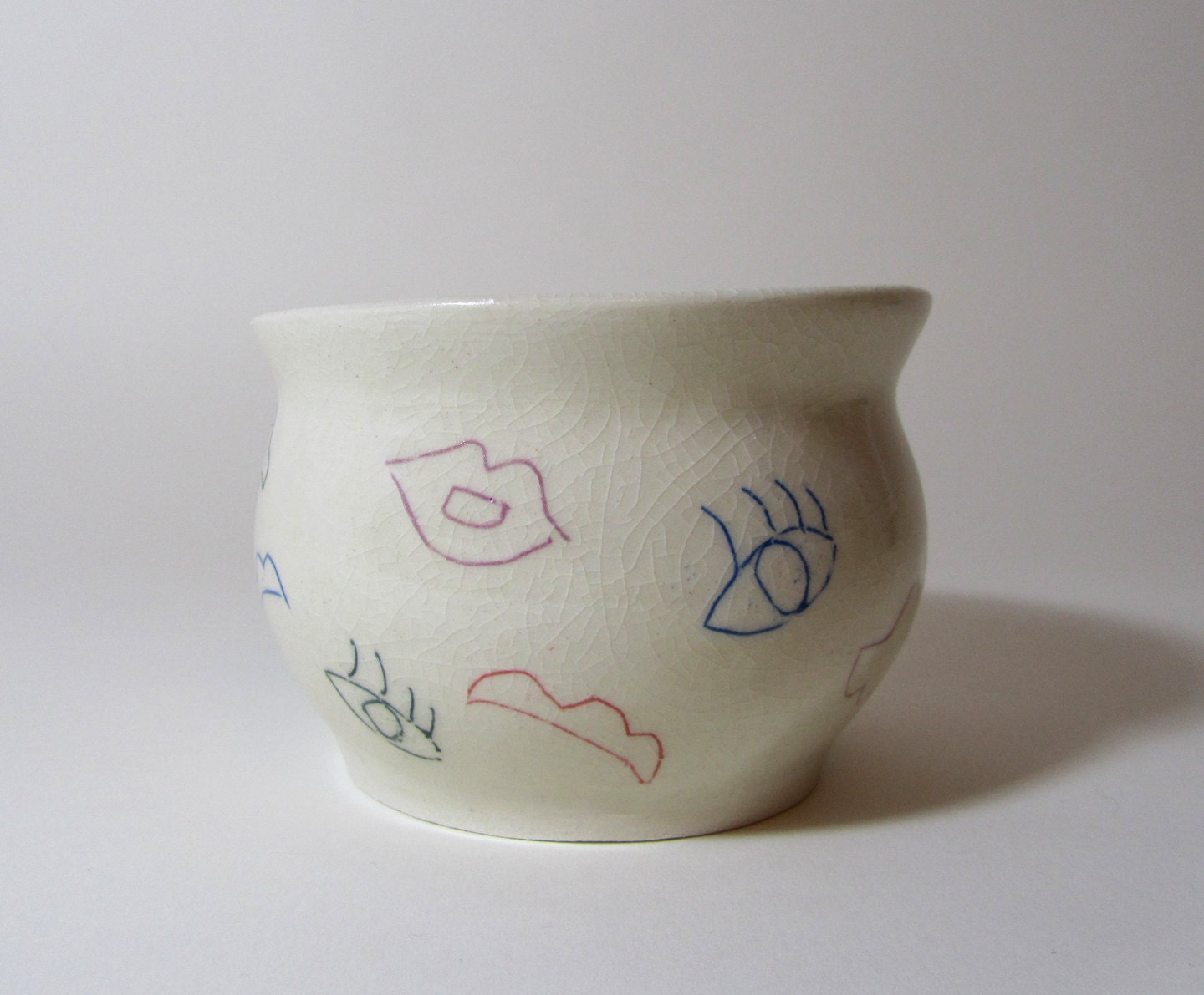 Mixed-Up Face bowl: Lips, eyes, nose, eyebrows all over the place....