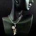 Sterling Silver Hanging Voodoo Doll Necklace