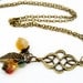 Mabon - Autumnal Equinox Necklace antique brass leaf & flower charms with faceted carnelian bead