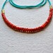 seaside reprise necklace with red coral and turquoise seed beads