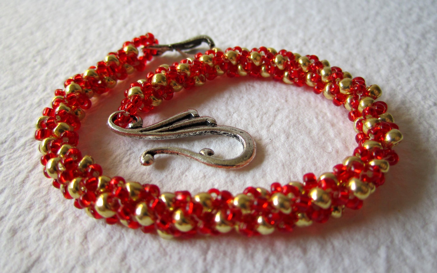 Gryffindor Red and Gold Skinny Spiral Bracelet by TangledCharm