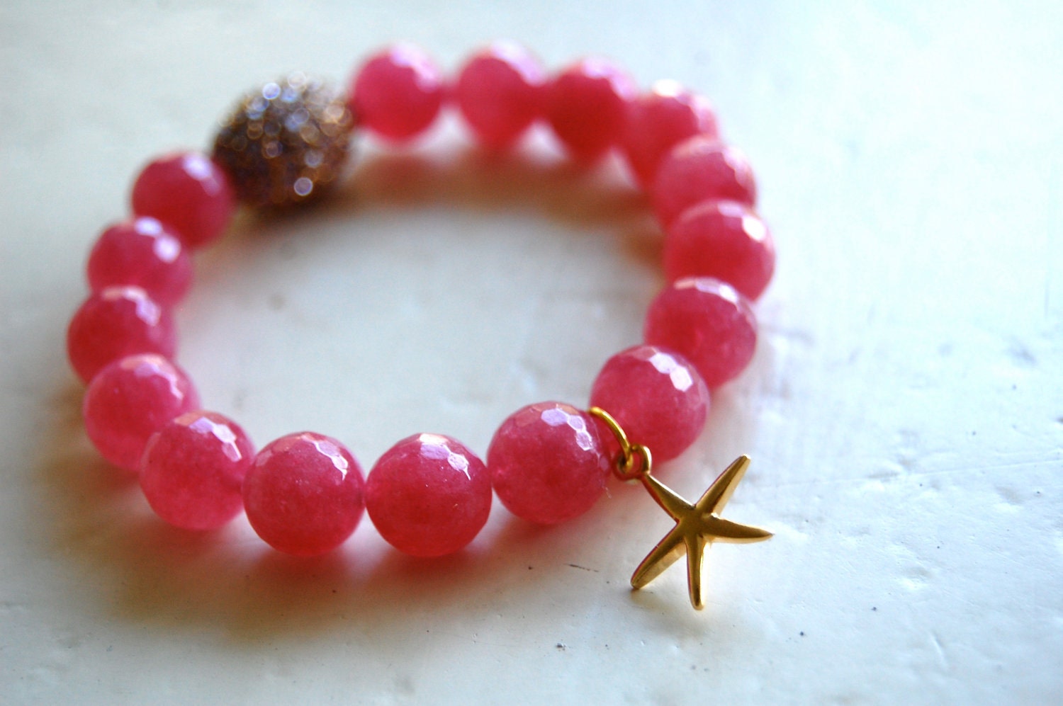 Gold vermeil Starfish MAKE A DIFFERENCE  charm bracelet on light ruby jade with crystal accent