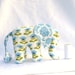 Elephant toy with pacifier tail and sound, blue and white. Made to order.