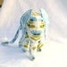 Elephant toy with pacifier tail and sound, blue and white. Made to order.