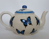 Teapot with blue butterflies