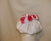 Round bag medium reversible shown in white and hot pink