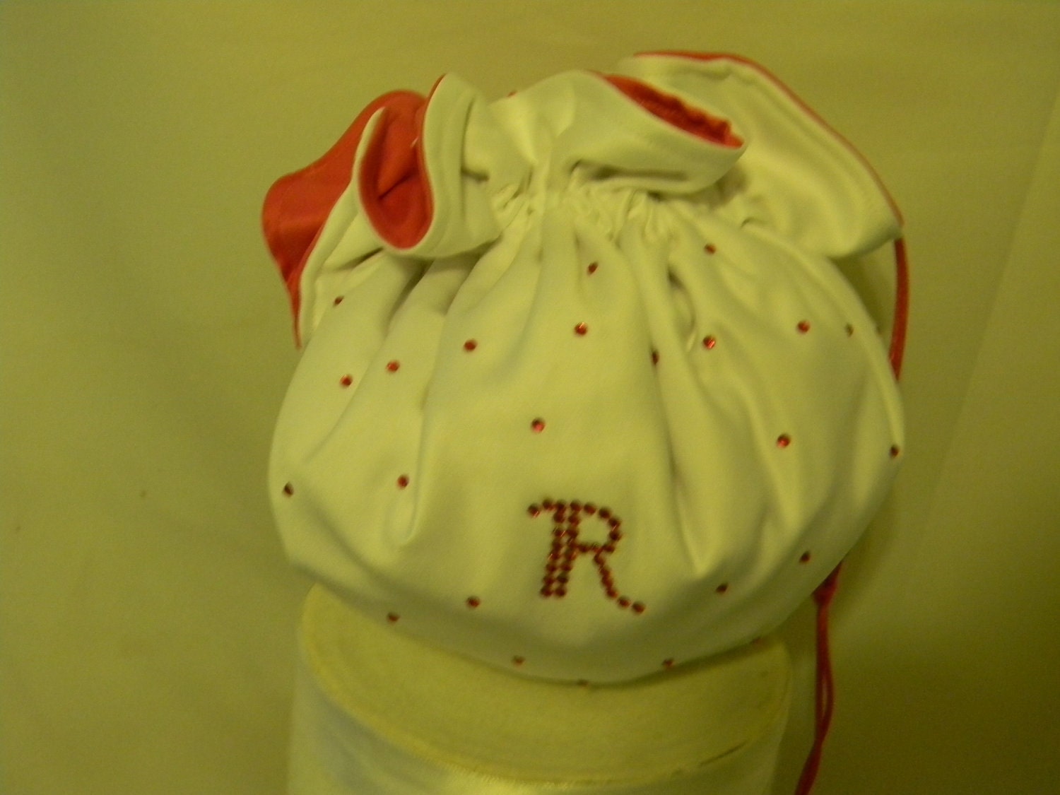 Round bag medium reversible shown in white hot pink and rhinestones